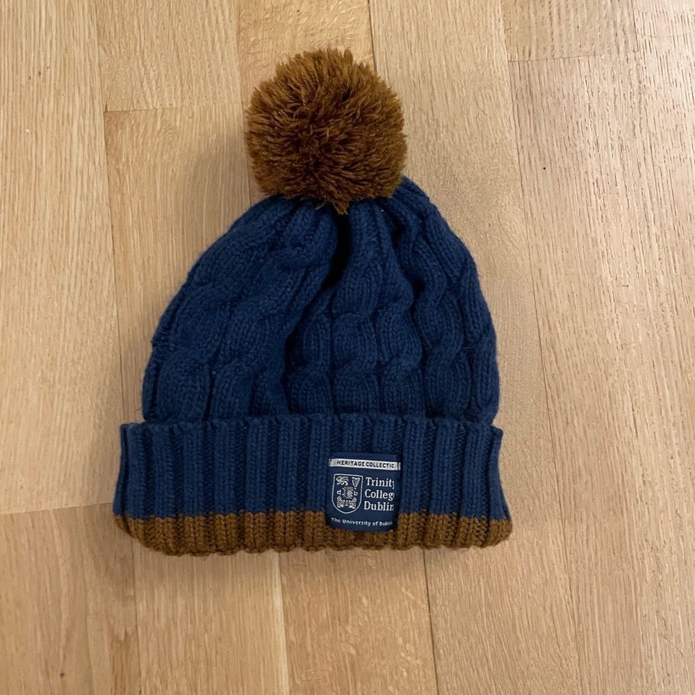 Blue and brown beanie with pompom